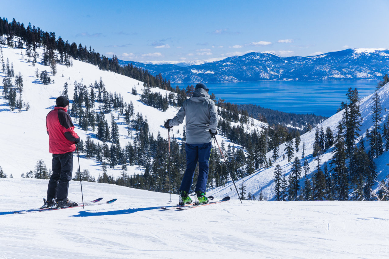 two skiers on the slopes